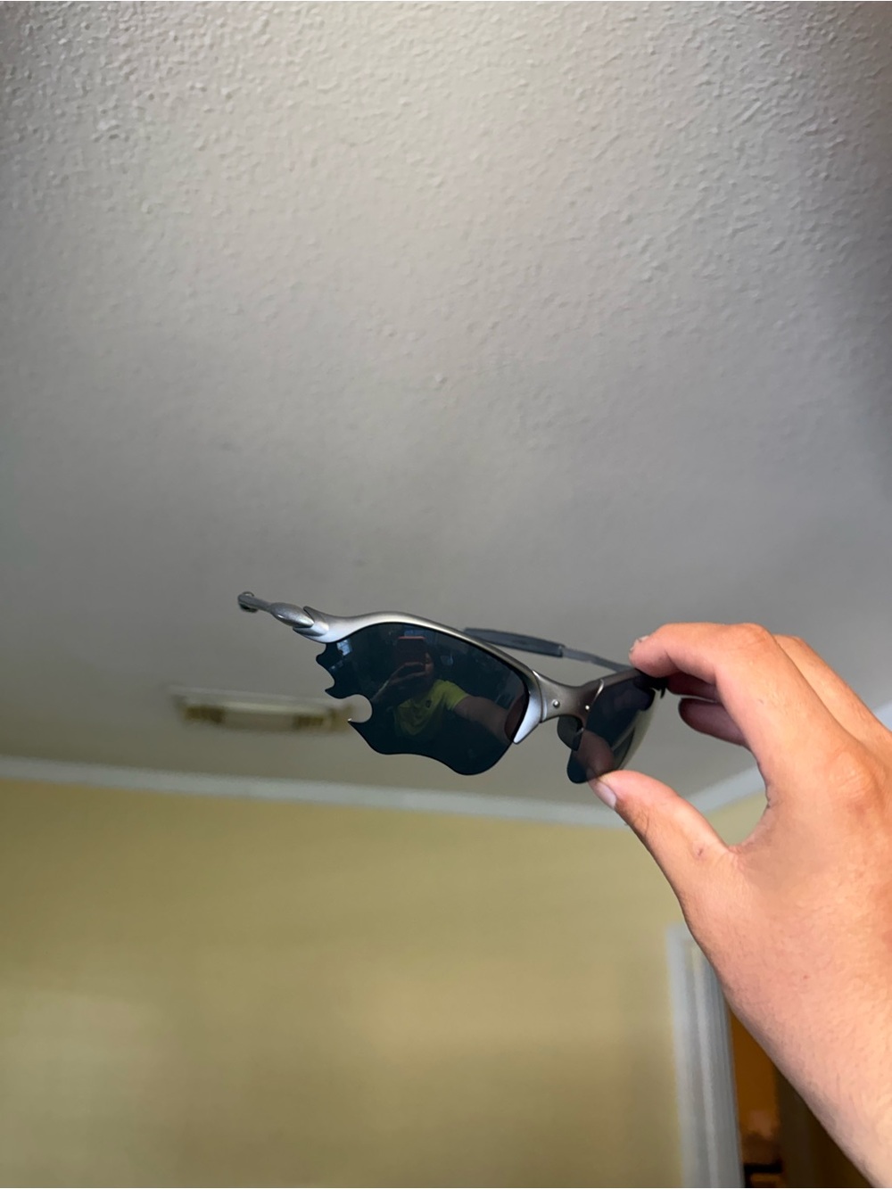Oakley Silver Frame Black Lens Wrap Sunglasses